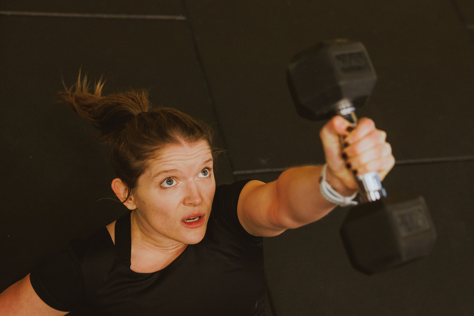 Member working hard through the final round of a coached class at Gymnasium