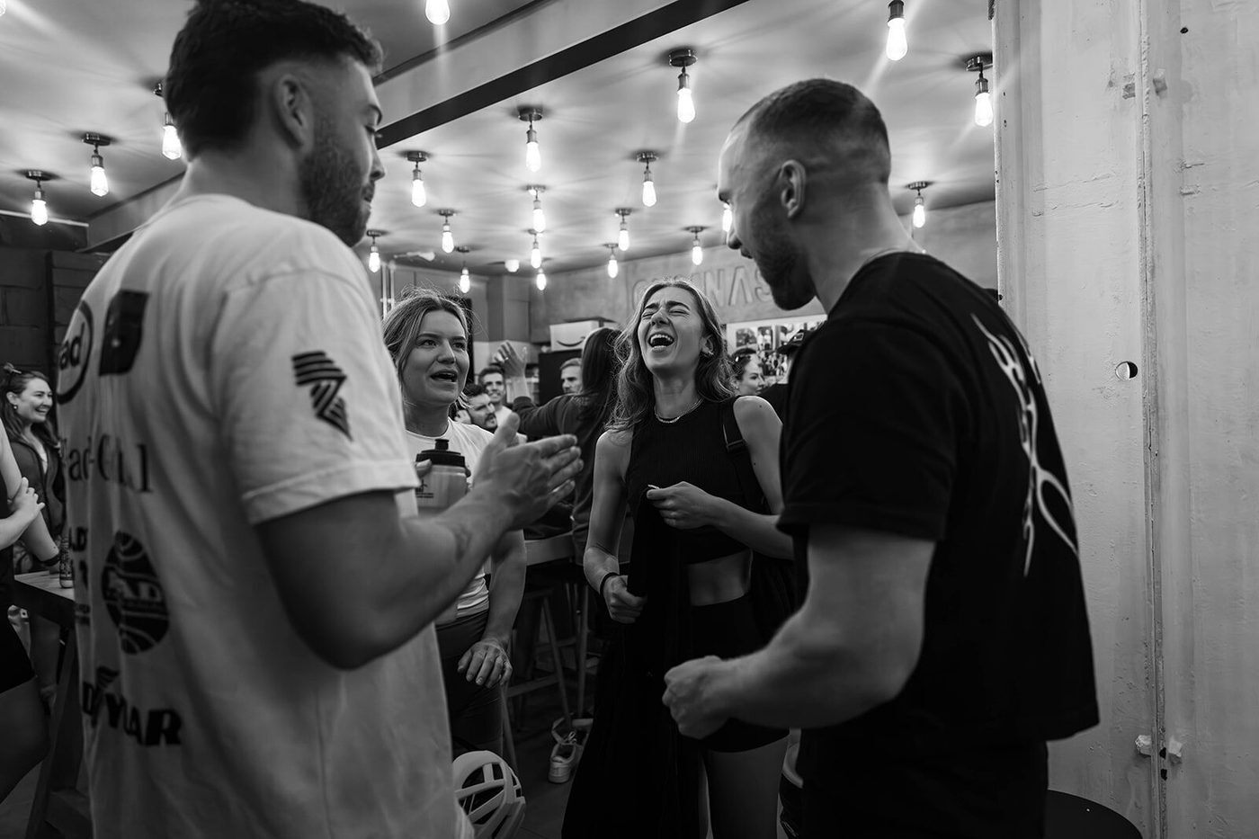 Gym members training together as a community