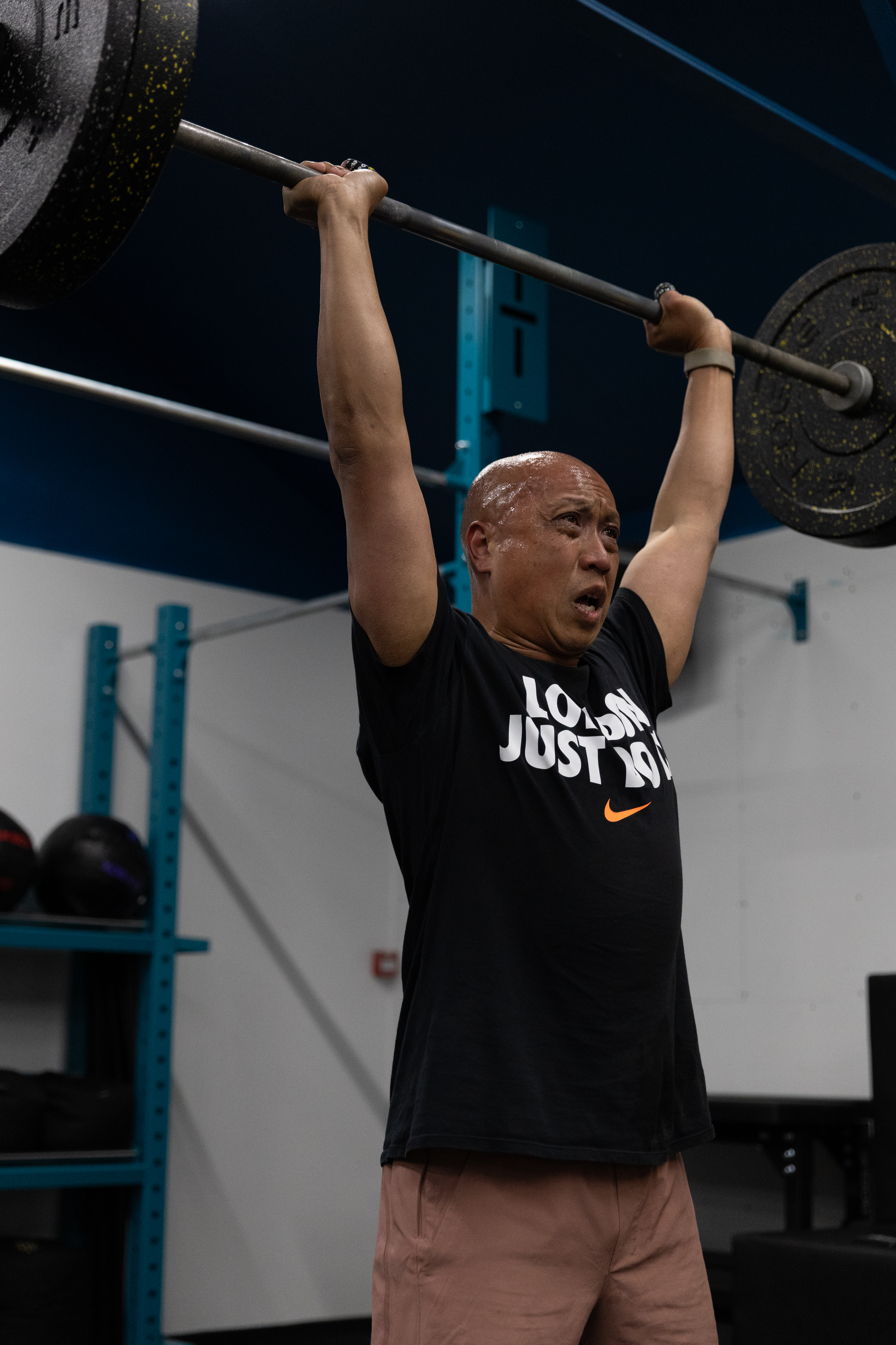 Functional fitness training with proper form and coaching