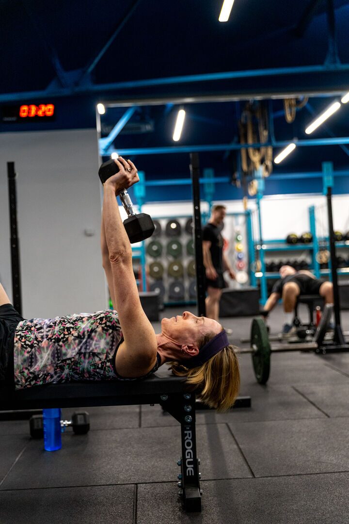 Woman performing strength training with proper form
